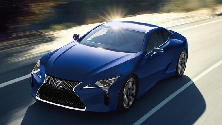 2024 Lexus LC 500h in blue on the road.
